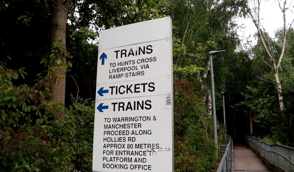 Platform information board at Halewood railway station Merseyside. Information for passengers wishing to go either to Warrington or Liverpool